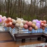 A bunch of balloons that are on the ground